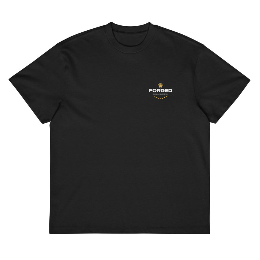 Earned Never Given Tee negra, vista delantera con el sello Forged en el pecho