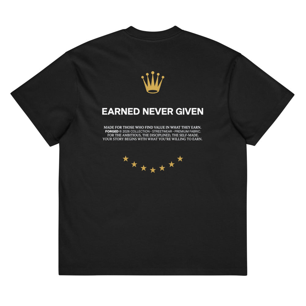 Earned Never Given Tee negra, espalda con la corona dorada y Earned Never Given