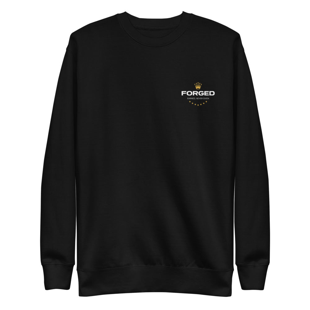 Earned Crewneck in black, front view with the Forged seal on the chest